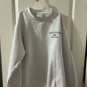 very nice white sweater with green embroidery on it. perfect for coffee lovers!!